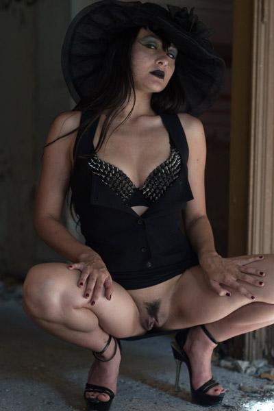 Alluring dark-haired goth hottie flashing her cooch in an abandoned building in Girlfolio set Black Widow