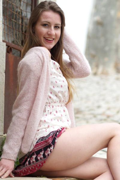 Flirtatious vixen lifting her dress to flash feminine assets in Girlfolio set Sightseeing Part 1