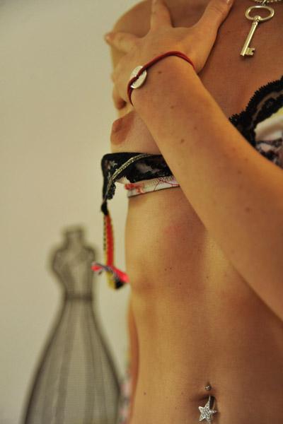 Short-haired coquette cupping her small boobies with delicate hands in Breathtakers set Boudoir